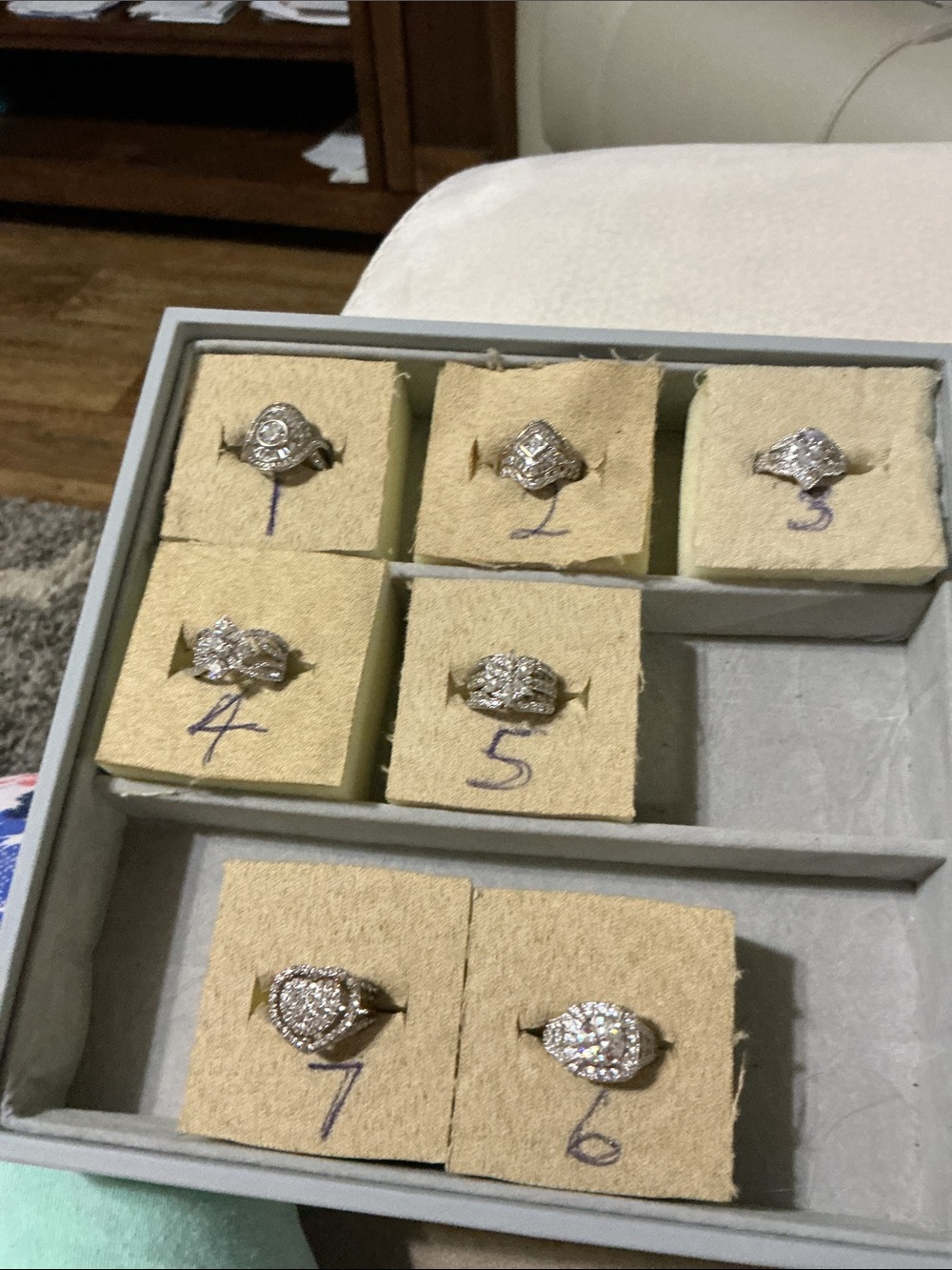 Ladies tray  of 7 rings ss/rhodium, sz 5, gently or never worn, $32 ea